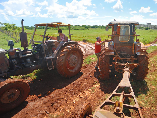 Cuban farmers could certainly use some new tractors. These relics on a farm south in the village of Melena del Sur are typical of the tractors Cubans have kept running since the U.S. embargo started more than 60 years ago. (DTN/The Progressive Farmer photo by Jim Patrico)
